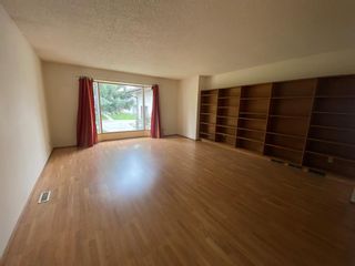 Photo 5: 60 Woodview Court SW in Calgary: Woodlands Detached for sale : MLS®# A2054538