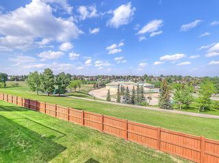 Photo 5: 36 140 Strathaven Circle SW in Calgary: Strathcona Park Semi Detached (Half Duplex) for sale : MLS®# A2054443