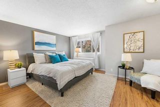 Photo 14: 563 Queenston Gardens SE in Calgary: Queensland Row/Townhouse for sale : MLS®# A2126181
