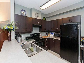 Photo 4: 130 10838 CITY Parkway in Surrey: Whalley Condo for sale in "THE ACCESS" (North Surrey)  : MLS®# F1408654