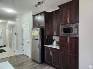 Photo 4: 410 Crystallina Nera Drive in Edmonton: Zone 28 House Half Duplex for sale : MLS®# E4383583