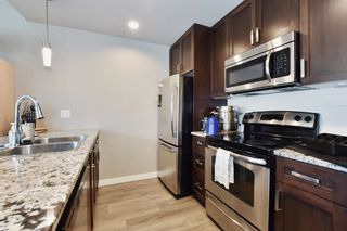 Photo 6: 412 2238 WHATCOM Road in Abbotsford: Abbotsford East Condo for sale in "WATERLEAF" : MLS®# R2771088