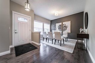 Photo 2: 28 ROCKFORD Terrace NW in Calgary: Rocky Ridge Detached for sale : MLS®# A1069939