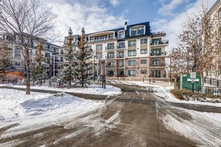 Main Photo: 407 211 Quarry Way SE in Calgary: Douglasdale/Glen Apartment for sale : MLS®# A2108507