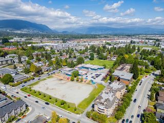 Photo 39: 102 2110 ROWLAND Street in Port Coquitlam: Central Pt Coquitlam Condo for sale in "AVIVA ON THE PARK" : MLS®# R2895557