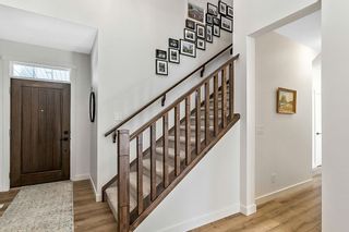 Photo 5: 290 Crestmont Drive SW in Calgary: Crestmont Detached for sale : MLS®# A2039758