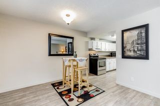 Photo 6: 101 1540 29 Street NW in Calgary: St Andrews Heights Row/Townhouse for sale : MLS®# A2023142