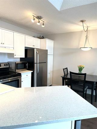 Photo 10: 405 10 Sierra Morena Mews SW in Calgary: Signal Hill Apartment for sale : MLS®# A2030186
