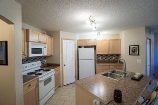 Photo 11: 104 3 EVERRIDGE Square SW in Calgary: Evergreen Row/Townhouse for sale : MLS®# A1143635