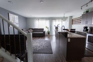 Photo 3: 404 255 Peguis Street in Winnipeg: Devonshire Village Condominium for sale (3K)  : MLS®# 202310167