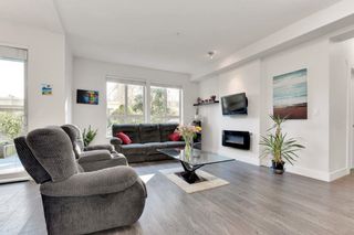 Photo 2: 105 2288 WELCHER Avenue in Port Coquitlam: Central Pt Coquitlam Condo for sale in "AMANTI" : MLS®# R2658298