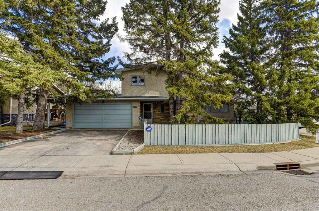 Main Photo: 10516 Brackenridge Road SW in Calgary: Braeside Detached for sale : MLS®# A1093414