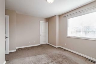 Photo 10: 21 Crystal Shores Cove: Okotoks Row/Townhouse for sale : MLS®# A2126777