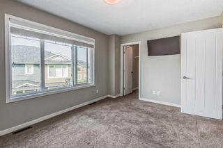 Photo 17: 227 Panatella Walk NW in Calgary: Panorama Hills Row/Townhouse for sale : MLS®# A2074189