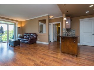 Photo 16: 312 2068 SANDALWOOD Crescent in Abbotsford: Central Abbotsford Condo for sale in "THE STERLING" : MLS®# R2706679