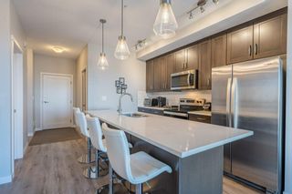 Main Photo: 405 71 Shawnee Common SW in Calgary: Shawnee Slopes Apartment for sale : MLS®# A2045858