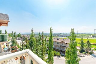 Photo 25: 14 108 Rockyledge View NW in Calgary: Rocky Ridge Row/Townhouse for sale : MLS®# A2068253