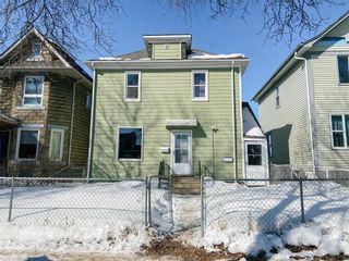 Photo 1: Spacious home with income property! in Winnipeg: 5C House for sale (West End) 