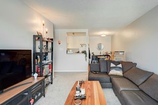 Photo 4: 401 823 1 Avenue NW in Calgary: Sunnyside Apartment for sale : MLS®# A2025114