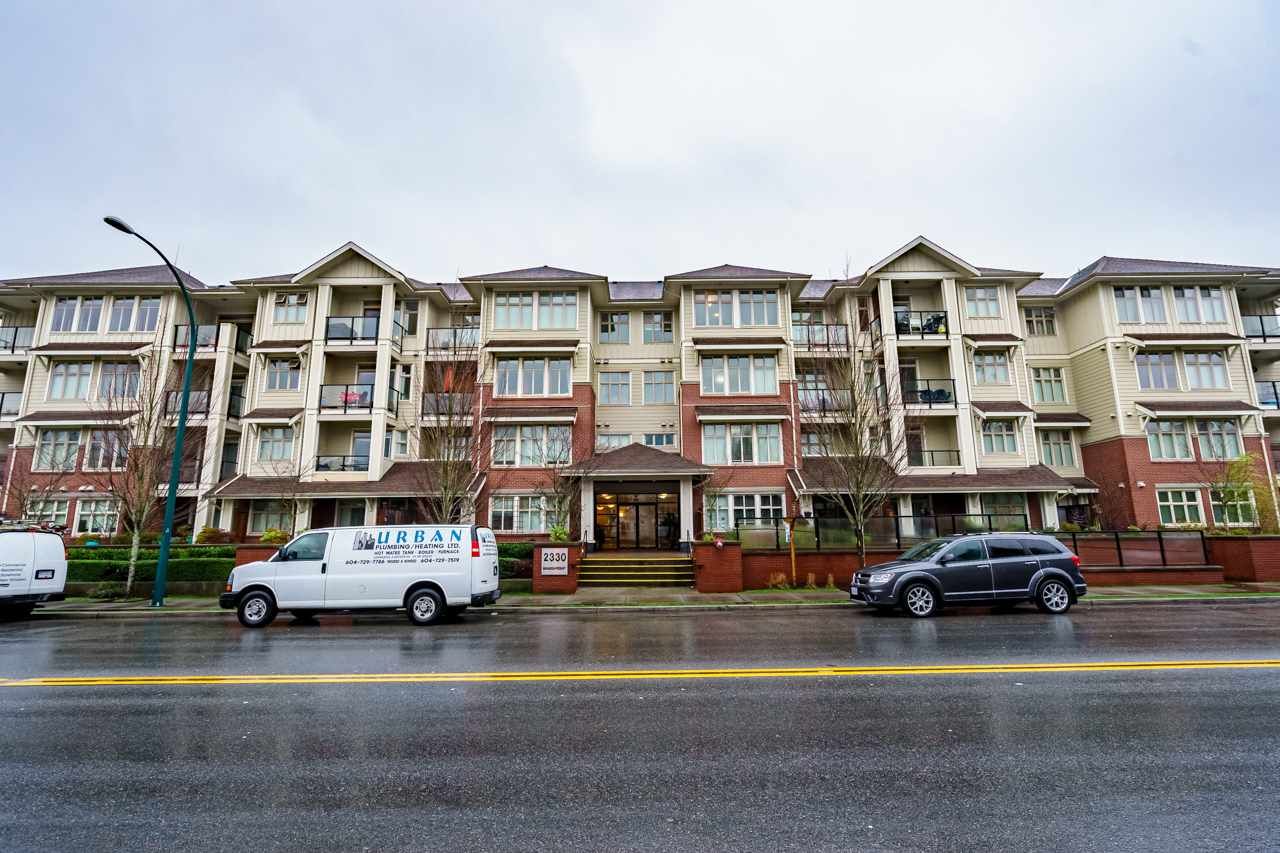 Main Photo: 411 2330 SHAUGHNESSY Street in Port Coquitlam: Central Pt Coquitlam Condo for sale in "AVANTI" : MLS®# R2526195
