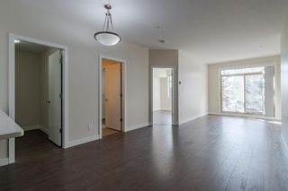 Photo 8: 212 28 Auburn Bay Link SE in Calgary: Auburn Bay Apartment for sale : MLS®# A1250132