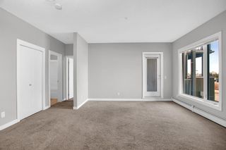 Photo 7: 2215 604 East Lake Boulevard NE: Airdrie Apartment for sale : MLS®# A2043886