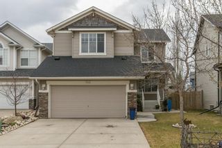Photo 1: 143 COUGARSTONE Garden SW in Calgary: Cougar Ridge Detached for sale : MLS®# C4295738