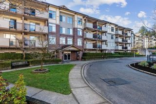 Photo 1: 411 10088 148 Street in Surrey: Guildford Condo for sale in "Guildford Park Place" (North Surrey)  : MLS®# R2653004
