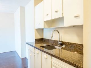 Photo 5: 414 630 CLARKE Road in Coquitlam: Coquitlam West Condo for sale in "King Charles Court" : MLS®# R2556475