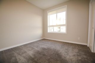 Photo 6: 203 8530 8A Avenue SW in Calgary: West Springs Apartment for sale : MLS®# A1139905