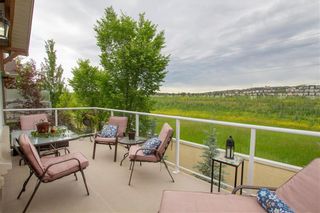 Photo 5: 18 DISCOVERY WOODS Villas SW in Calgary: Discovery Ridge Semi Detached for sale : MLS®# A1015288