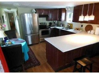 Photo 1: 23 4200 DEWDNEY TRUNK Road in Coquitlam: Ranch Park Manufactured Home for sale in "HIDEWAY PARK" : MLS®# V984553