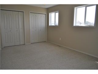Photo 8: 159 BAYSIDE Point SW: Airdrie Townhouse for sale : MLS®# C3566247