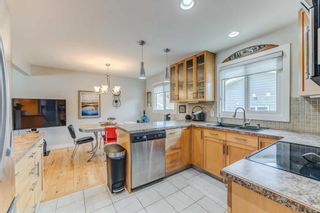 Photo 10: 7707 34 Avenue NW in Calgary: Bowness Detached for sale : MLS®# A2068447