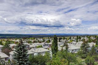 Photo 3: 7767 Springbank Way SW in Calgary: Springbank Hill Detached for sale : MLS®# A2060144