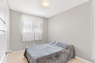 Photo 12: 214 Pantego Lane NW in Calgary: Panorama Hills Row/Townhouse for sale : MLS®# A1188181