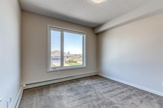 Photo 12: 12 30 Shawnee Common SW in Calgary: Shawnee Slopes Apartment for sale : MLS®# A2123625
