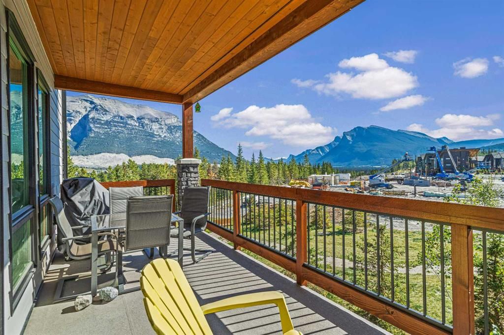 Main Photo: 217 106 STEWART CREEK Rise: Canmore Apartment for sale : MLS®# A2081196