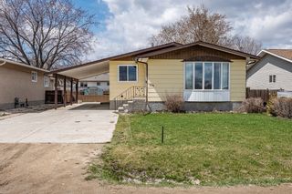 Photo 1: 775 8th Street NW in Portage la Prairie: House for sale : MLS®# 202313249