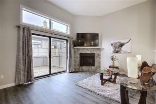 Photo 1: 18 23 GLAMIS Drive SW in Calgary: Glamorgan Row/Townhouse for sale : MLS®# C4293162