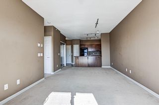 Photo 11: 1407 92 CRYSTAL SHORES Road: Okotoks Apartment for sale : MLS®# A1222250