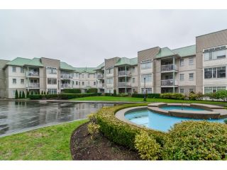 Photo 1: 204 9763 140 Street in Surrey: Whalley Condo for sale in "FRASER GATE" (North Surrey)  : MLS®# R2021551
