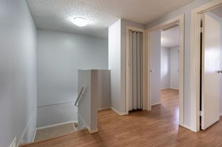 Photo 8: 521 Queenston Gardens SE in Calgary: Queensland Row/Townhouse for sale : MLS®# A1216265