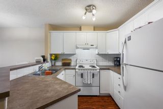 Photo 10: 1220 950 Arbour Lake Road NW in Calgary: Arbour Lake Apartment for sale : MLS®# A1237454