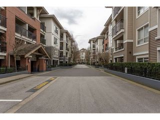 Photo 2: A419 8929 202 Street in Langley: Walnut Grove Condo for sale in "THE GROVE" : MLS®# R2557096