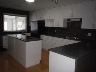 Photo 6: 2 Westhill Place: Didsbury Semi Detached (Half Duplex) for sale : MLS®# A2025445