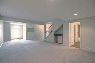 Photo 28: 144 1000 Glenhaven Way: Cochrane Semi Detached (Half Duplex) for sale : MLS®# A2010215