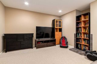 Photo 33: 200 Cougartown Close SW in Calgary: Cougar Ridge Detached for sale : MLS®# A2124049