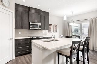 Photo 2: 704 428 Nolan Hill Drive NW in Calgary: Nolan Hill Row/Townhouse for sale : MLS®# A2054305