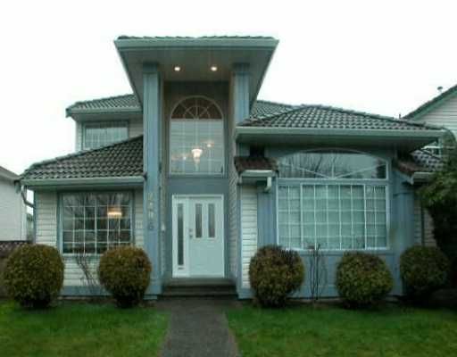 Main Photo: 2496 COAST MERIDIAN Road in Port Coquitlam: Riverwood House for sale in "BIRCHLAND MANOR" : MLS®# V635754
